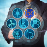 Blue chip manager monitoring energy efficiency via a virtual control interface. Industry concept for efficient energy use, sustainability reporting, audit and rise in renewable power generation.